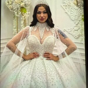 Elegant White Pearl-Embellished Gown